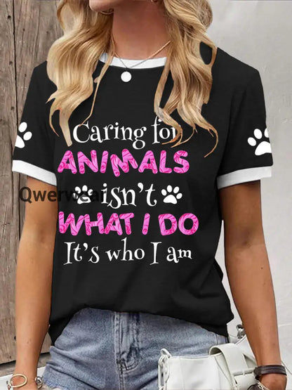 Women’s caring for animals isn’t what I do it’s who I am T-shirt Black / S